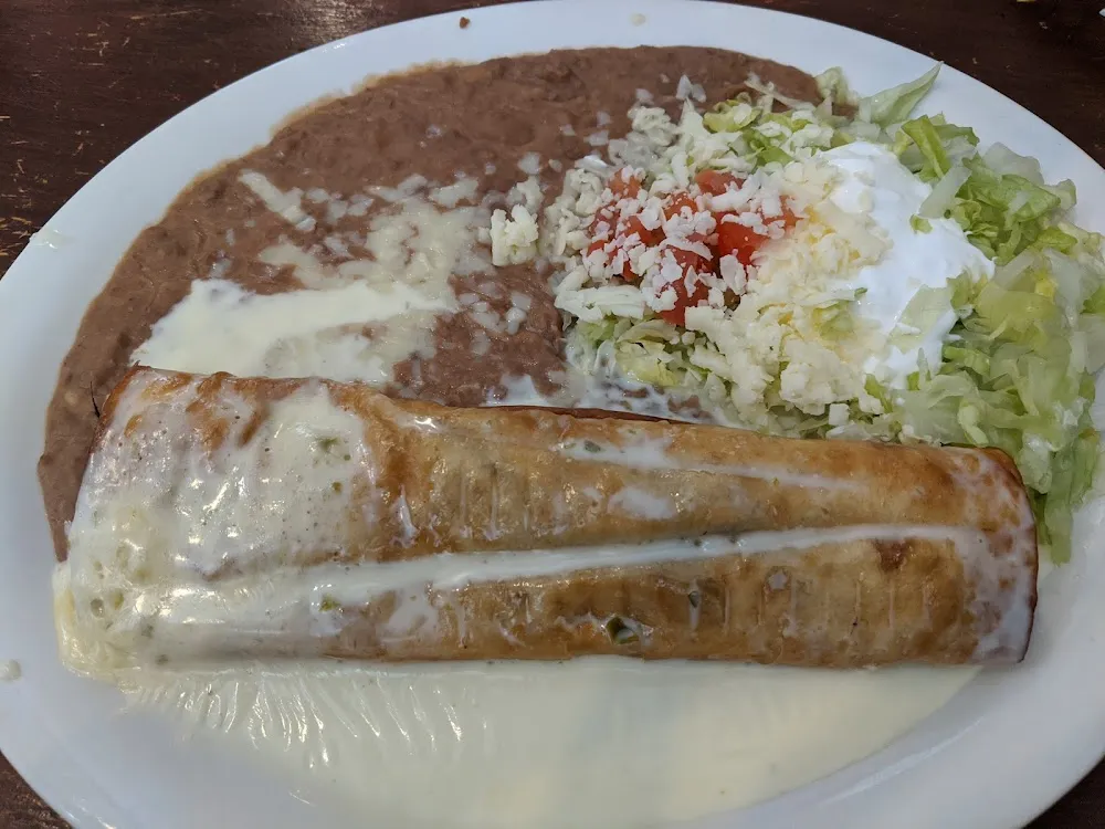 Enchilada Chile Relleno Rice and Beans Combo
